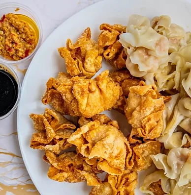 Half fried, half steamed pork siomai with chili garlic and soylime